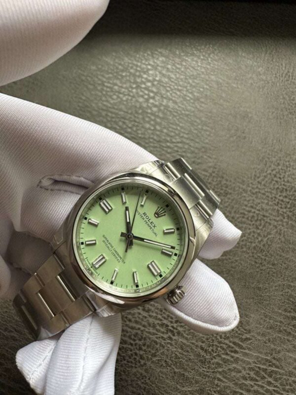Rolex New Oyster Perpetual Pistachio Dial Reference 134300 - Image 3