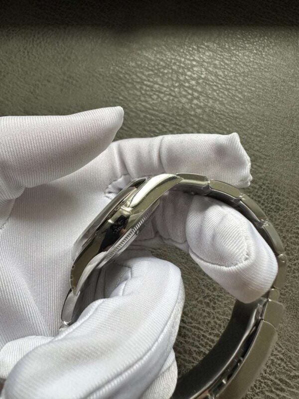 Rolex New Oyster Perpetual Pistachio Dial Reference 134300 - Image 5